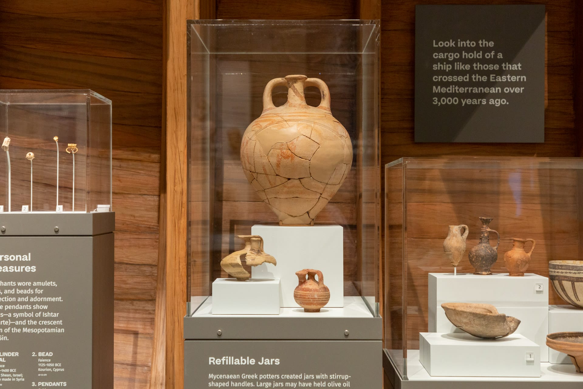The ship's cargo hold is modeled after a wrecked 14th-century BCE Mediterranean ship, filled with pottery vessels and objects of bronze, copper, faience, glass, and ivory—a nod to the international trade and exchange of ideas that characterized the region in ancient times.