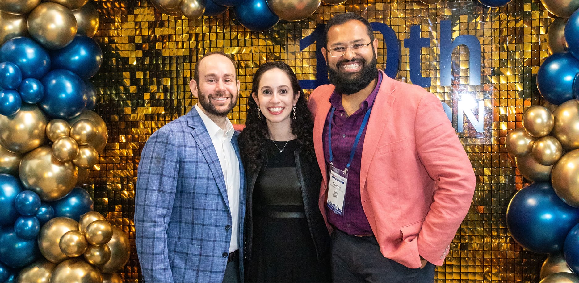 alumni at event with balloons