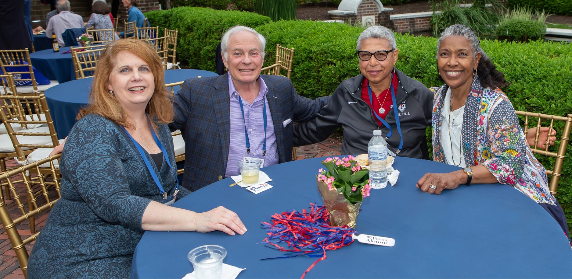 alumni sitting at table