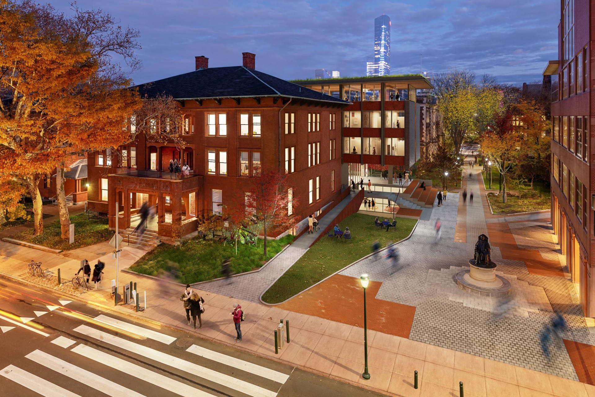 An exterior rendering of Stuart Weitzman Hall in the evening.