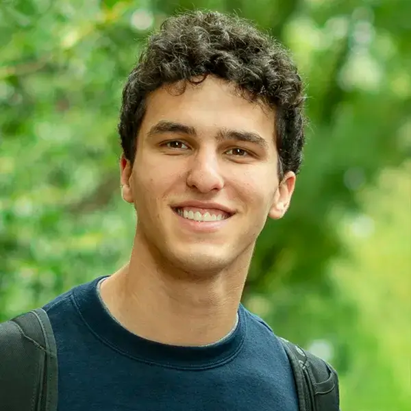 A University of Pennsylvania student outdoors, embodying The Penn Fund’s mission to support undergraduate campus life and learning.